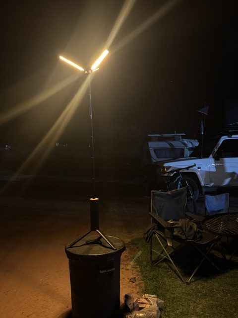 BougeRV T1 telescopic camping light extended and illuminated at night